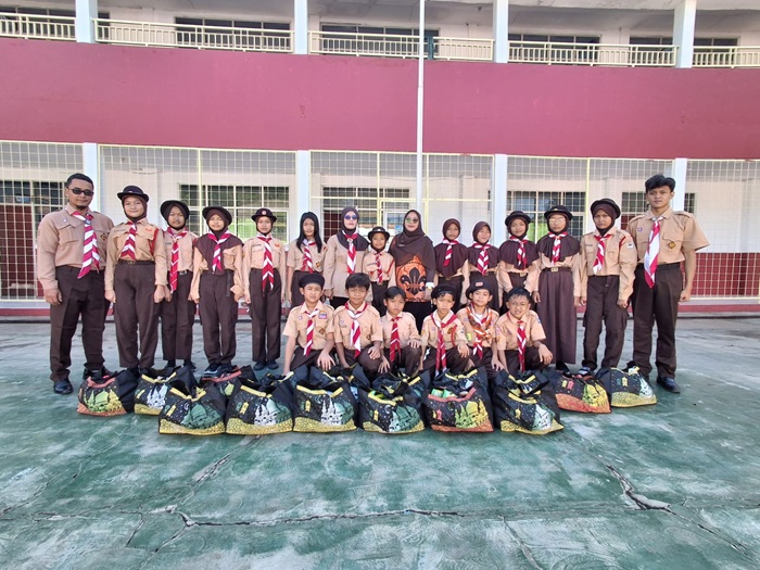 Kompak, Pramuka SDN Palasari 01 Adakan Giat Berbagi dan Santunan