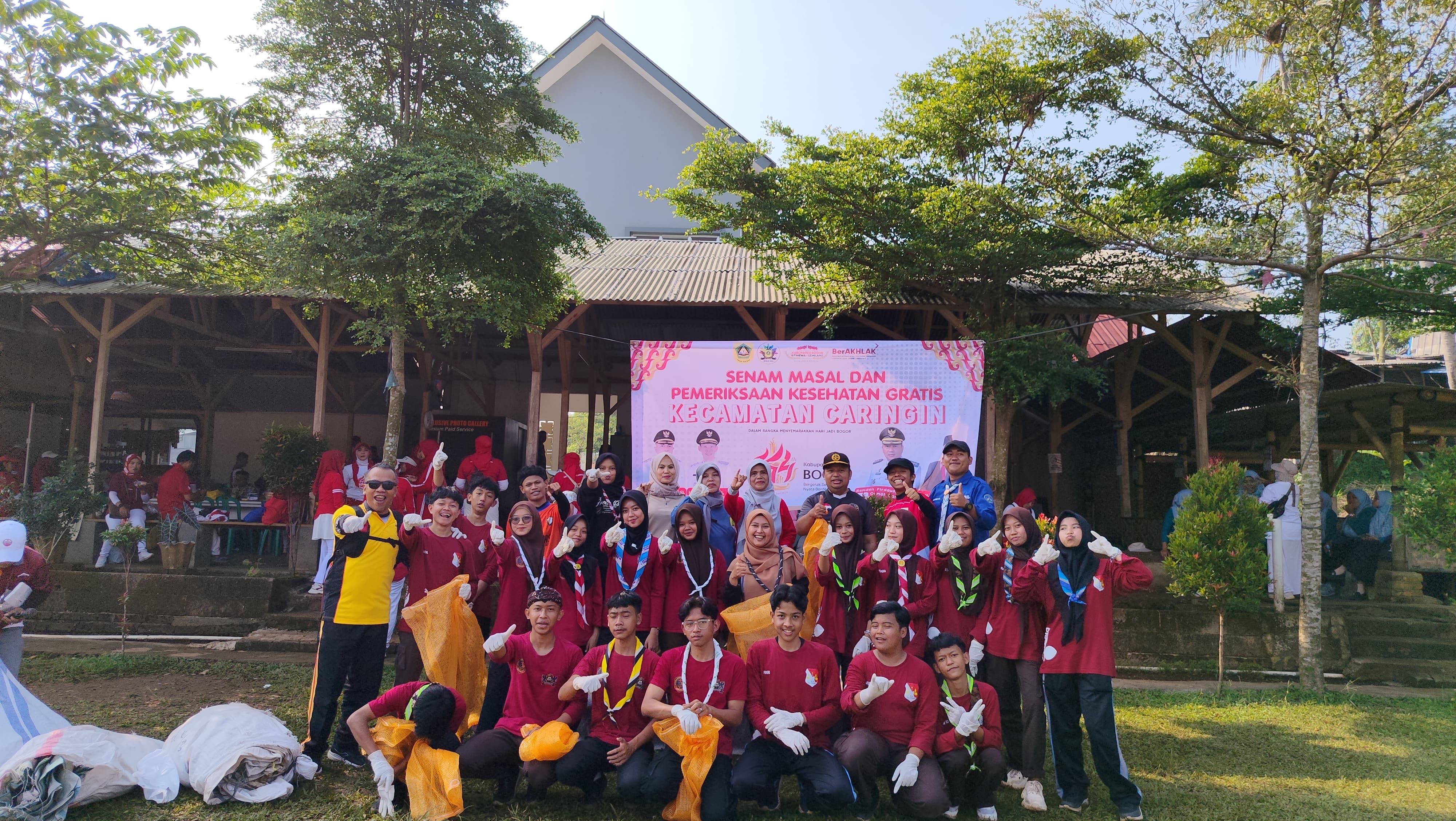 Pramuka Kwarran Caringin Turut Ambil Bagian dalam Aksi Bersih Sungai Cisadane dan Pemeriksaan Kesehatan Massal