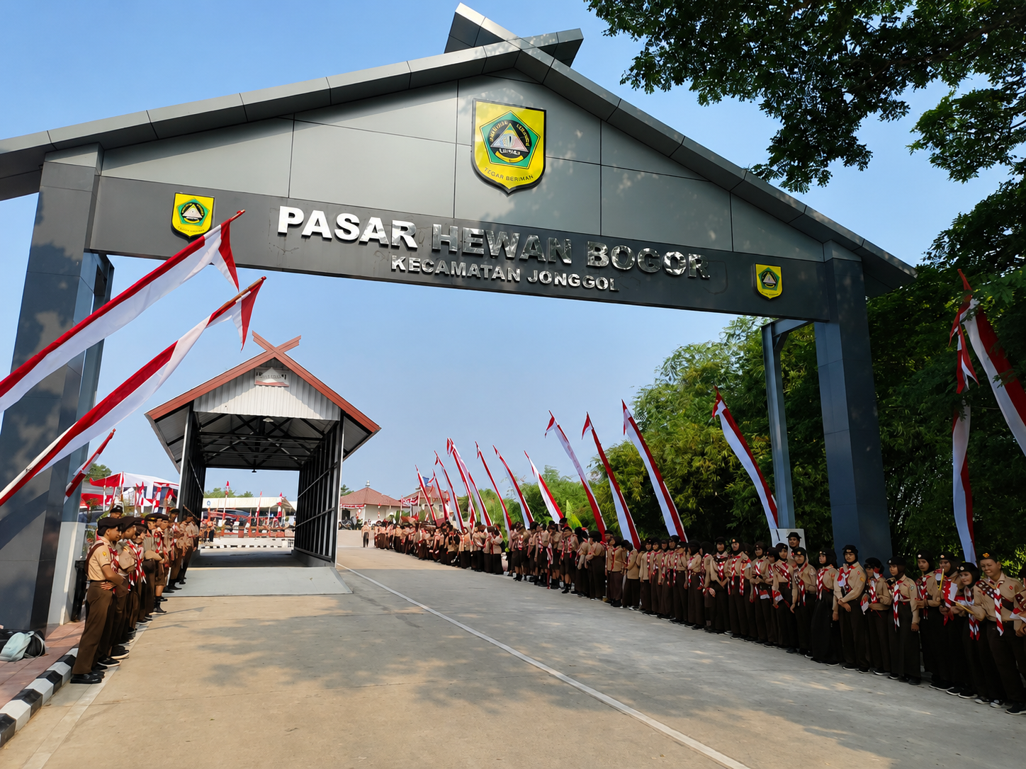 Kwarran Jonggol Kerahkan Anggota Pramuka Sambut Kehadiran Bupati Bogor pada Peresmian Pasar Hewan Bogor di Kecamatan Jonggol - Copy